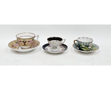 Swansea porcelain teacup and saucer, circa 1825, red SWANSEA/257 to saucer, painted with pink bell-shaped petals, gilt pineco