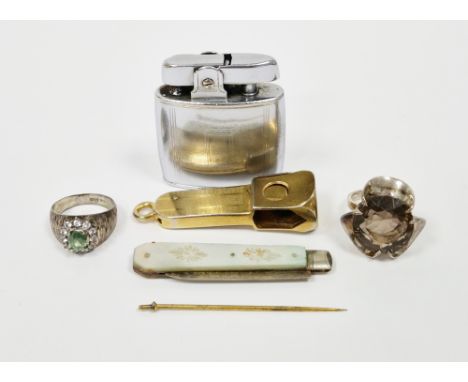 Two silver rings including modernist silver ring claw-set with a large round faceted smoky quartz within a trefoil mount, siz