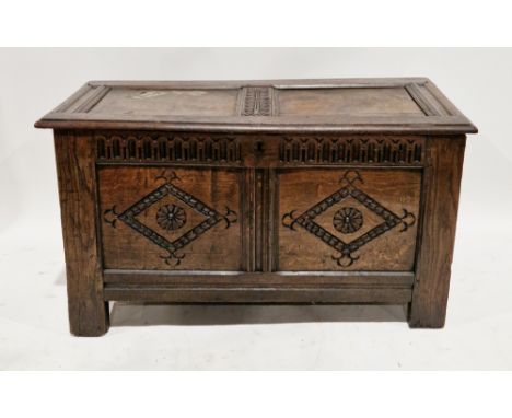 18th century oak coffer, the hinged two panel rectangular lid with thumbmould edge, over a two panel front with lunette and f