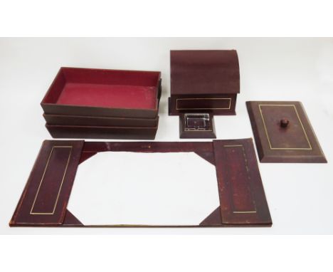 Mid-20th century &lsquo;Fortnum &amp; Mason of London&rsquo; desk set, each item with a tooled burgundy leather finish, compr