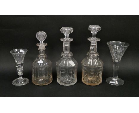 Pair of 19th century glass decanters and stoppers&nbsp;of mallet form, 30cm high,&nbsp;another similar decanter, 27cm high, a
