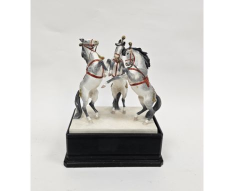 Royal Worcester group of the 'Trio of Circus Horses' modelled by Doris Lindner on an ebonised plinth base, modelled as three 