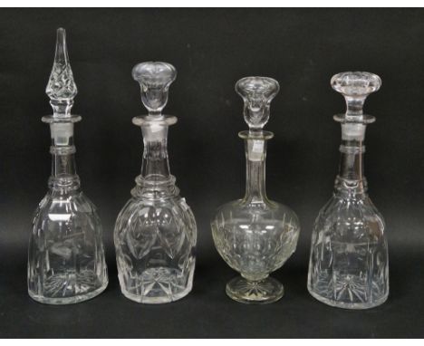 Four 19th century cut glass decanters and stoppers, some stoppers matched, including a mallet-shaped decanter cut with lenses
