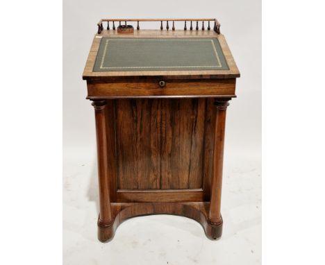 Victorian rosewood davenport with turned spindle gallery border, tooled green leather inset writing surface, four drawers and