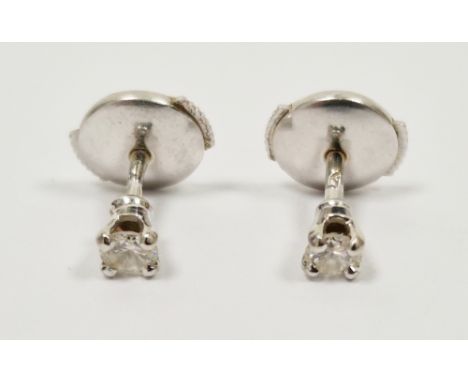 Pair diamond stud earrings, white metal set, in case  Condition Report Total weight - 1.4 gramsDiamond diameter 3mm