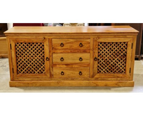 John Lewis 'Maharani' hardwood sideboard&nbsp;comprising three short drawers flanked by pierced latticework cupboard doors, w