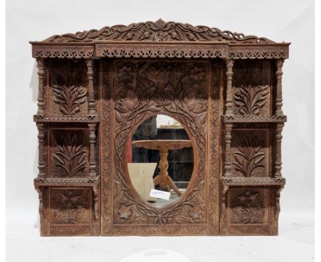 19th century Anglo-Indian hardwood overmantel mirror, the pediment carved with thistles over a frieze with pierced carved lea