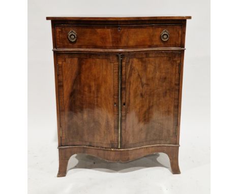 20th century mahogany and cross-banded side cabinet in the Regency manner, of serpentine outline comprising a long drawer wit