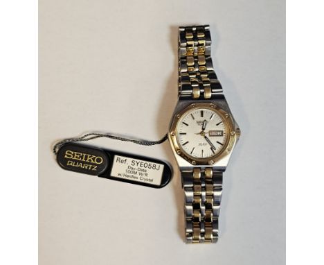 Lady's Seiko quartz SQ100 wristwatch, the grey dial with raised gilt baton hour markers, day date aperature at the quarter ho