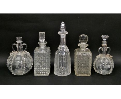 Two late 19th century Dutch engraved carafes and one stopper, engraved with windmills and fruiting vine within crimped bands,