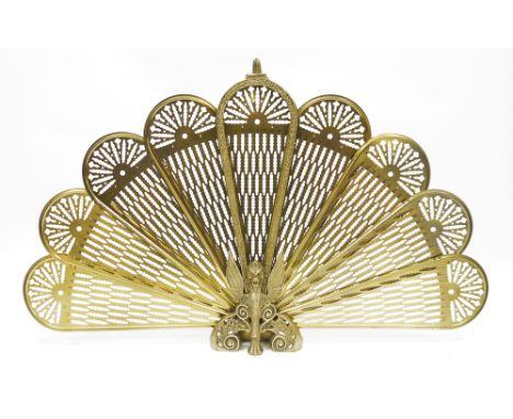 Mid-century Victorian style brass folding peacock fire screen, with pierced panels and the stand cast in the form of a mythic