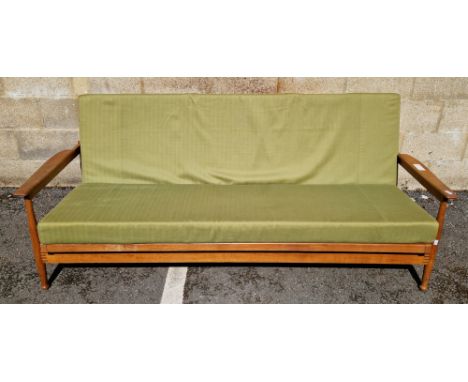 1960's teak day bed sofa&nbsp;designed by George Fejer and Eric Phamphilon for Guy Rogers, having angular elbow supports and 