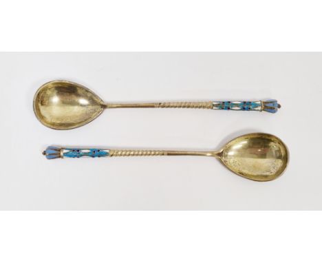 Pair of Russian silver-gilt and enamel spoons&nbsp;by Akimov of Moscow (1896-1908), the back of the bowls decorated in enamel