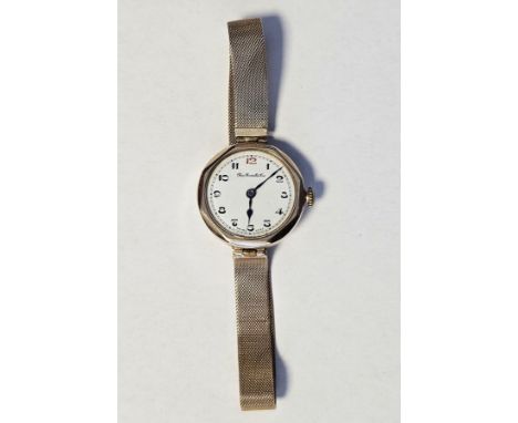 9ct yellow gold ' Thomas Russell &amp; Son ' lady's wrist watch, the octagonal dial holding a white enamel face with Arabic n