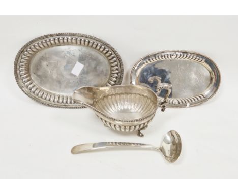 Sterling silver sauceboat&nbsp;on stand, both with gadrooned rims and half lobed body, the boat with leaf capped scrolling ha