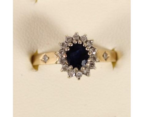 A 9ct gold sapphire and diamond cluster ring, 2.8gm, Q. 