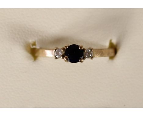 A 9ct gold sapphire and diamond three stone ring, 1.5gm, Q 