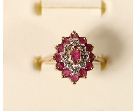 A 9ct gold ruby and diamond cluster ring, 2.4gm, O