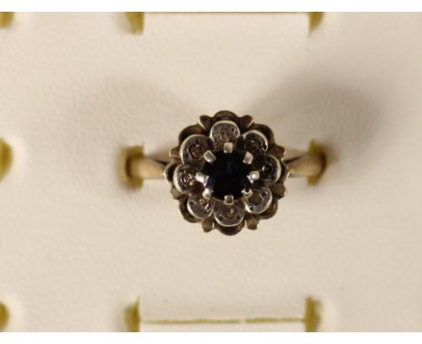A 9ct gold sapphire and diamond cluster ring, 3.6gm, R 