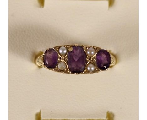 A 9ct gold amethyst and half pearl ring, 3.3gm, Q 1/2. 