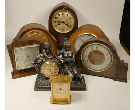 A collection of clocks to include, a Juliana bronze effect quartz clock, a London Clock Co. quartz carriage clock, together w