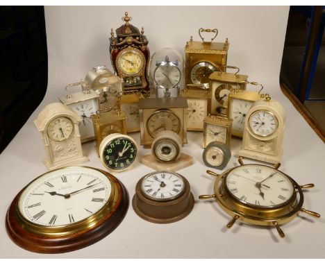 A collection of clocks to include, a marble barometer, a President Navigator quartz clock, together with other quartz clocks 