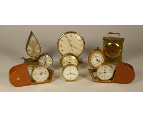 A collection of Swiza clocks to include, Swiza 8 15 Jewel green marble mantel clock, Swiza mignon 7 jewels desk clock and oth