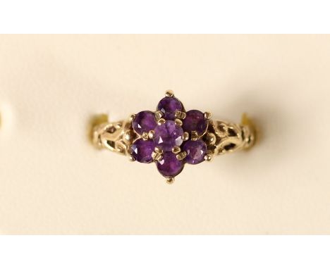 A 9ct gold and amethyst cluster ring, 3.2gm, P