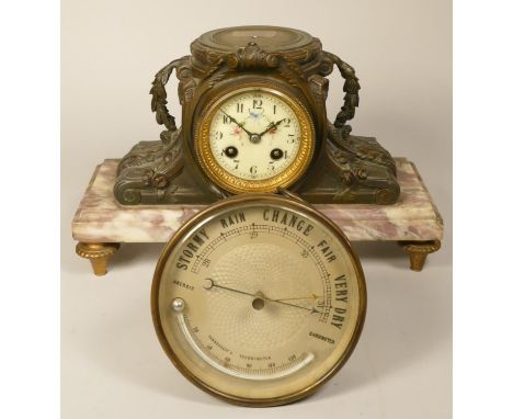 A Aneriod barometer and thermometer, diameter 14 cm, together with a french mantel clock on a onyx base, lacking surmount (2)