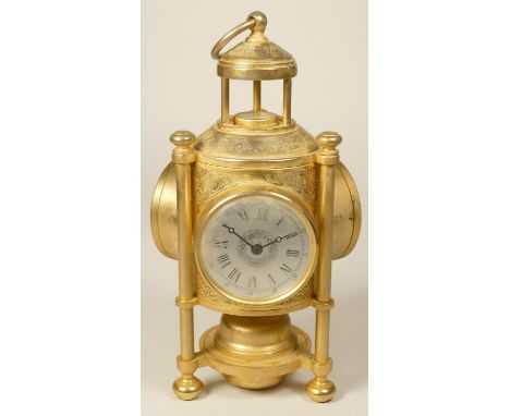 A brass desk compendium, comprising quartz clock, barometer, thermometer and compass, height 25 cm 