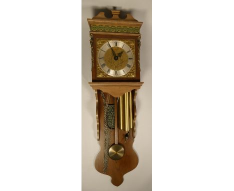 A collection of clocks to include, a large wooden wall clock complete with pendulum and weights, a Warmink wall clock, barome
