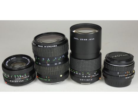 Four camera lenses, including a Pentax-M 28mm F/3.5 Lens w/ Original Lens Caps, together with a Canon FD 50mm F/1.8n, also in