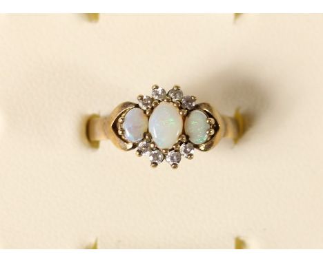 A 9ct gold opal and paste cluster ring, 2.4gm, O