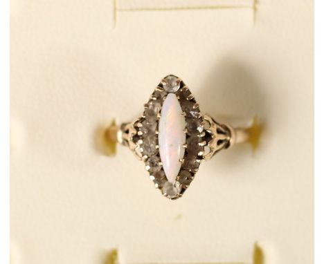 An Edwardian 9ct gold opal and paste cluster ring, Birmingham 1905, 1.6gm, N