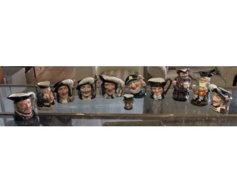 A collection of eleven Royal Doulton ceramic character jugs in various sizes. (11)