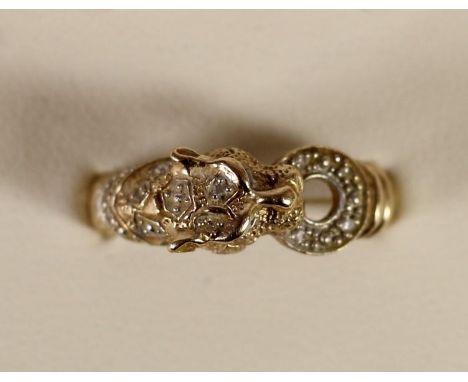 A 9ct gold and diamond set leopard ring, 2.5gm, P 1/2 