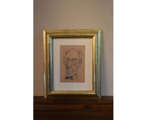 A gilt framed and glazed charcoal sketch, male portrait, monogrammed and dated. H.32 W.26cm 