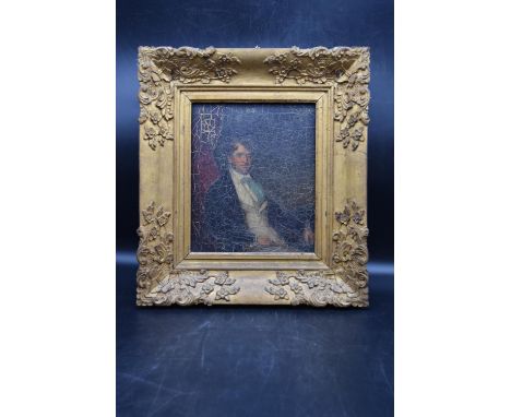 A carved gilt framed 19th century oil on board, portrait of a seated gentleman. Unsigned. H.46 W.40cm 