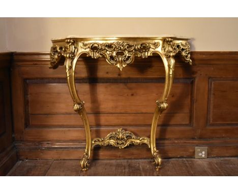 A Rococo style gilt console table with shaped marble top. H.87 W.92 D.30cm 