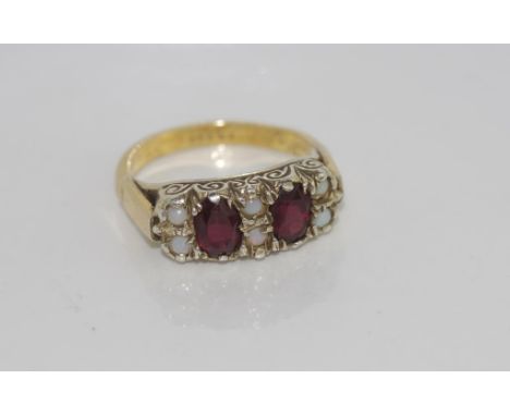 Boxed garnet and opal ring weight: approx 3.7 grams, size: K-L/5 with hallmarks on band