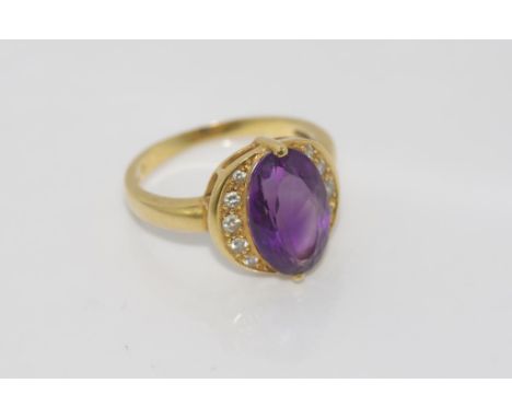 18ct yellow gold, amethyst & diamond ring weight: approx 4.9 grams, size: N-O/7