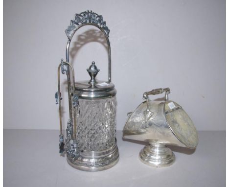 Two various antique silver plated table items including coal scuttle shaped sugar caddy. Marked for Walker & Hall; together w