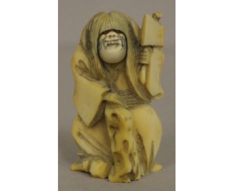 Antique Japanese ogre figure ivory netsuke with rotating face, C1920. Signed to base. May not be exported without CITES docum