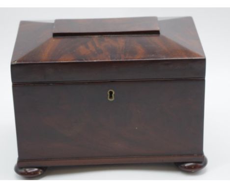 Regency period sarcophagus tea caddy flame mahogany  with twin lidded interior, 22cm wide, 16cm high approx