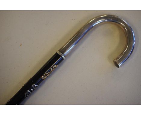 Russian silver and ebony walking stick (84 zolotnik 875/1000 purity), with 5 silver and 4 yellow gold emblems attached to the