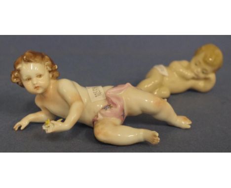 Italian porcelain piano doll together with a Nao lying child figurine, width 14cm approx (widest)