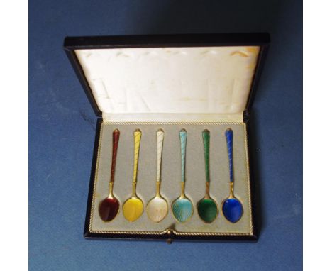 Boxed set six Danish silver & enamel teaspoons stamped "Denmark Sterling 925." Enamel handles and bowls, on gilded sterling s