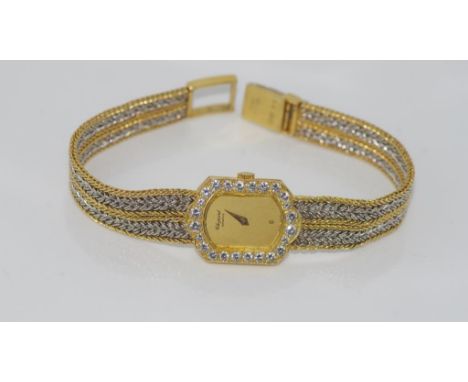 Vintage Chopard 18ct gold & diamond wristwatch with two tone gold band, battery operated, total weight: approx 32.1 grams