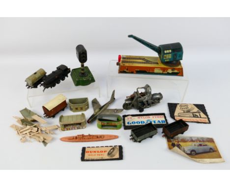 Mettoy - Astra - Biller - Hornby - A group of vintage toys including a Mettoy Military Motorcycle # 813 with rider and gun (h