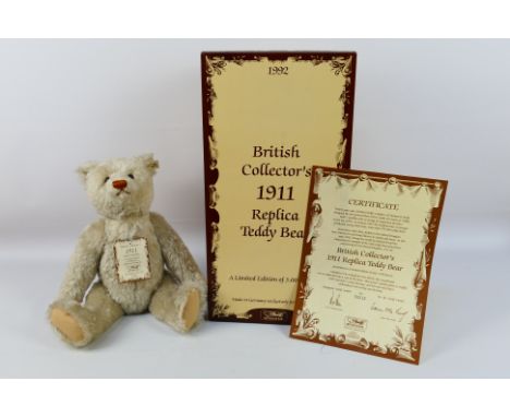Steiff - A boxed Limited Edition Steiff 'British Collectors 1911 Replica Teddy Bear'. The bear which stands 40 cms in height,